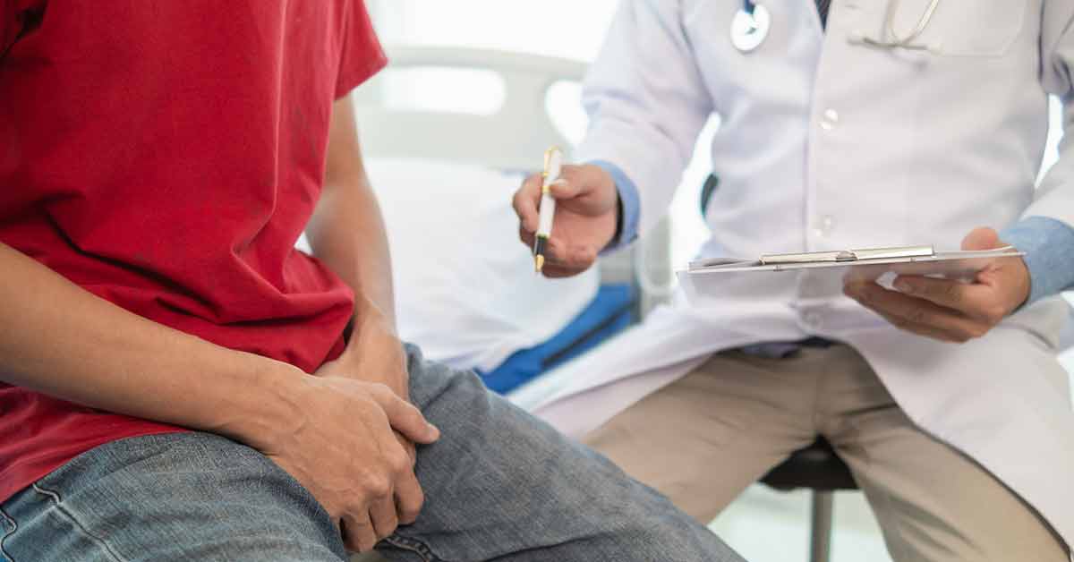 Man talking to doctor