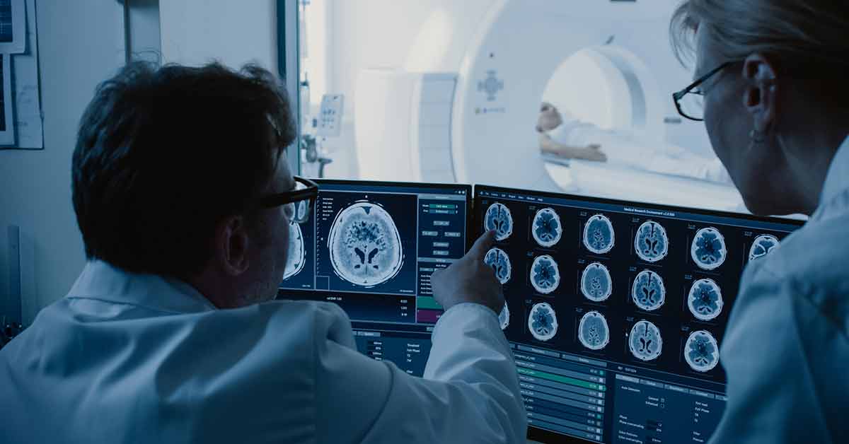 neurologist reviewing brain scan