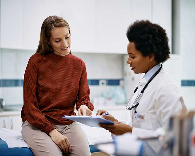 doctor talking to patient