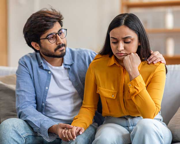 Couple is sitting quietly on Couch