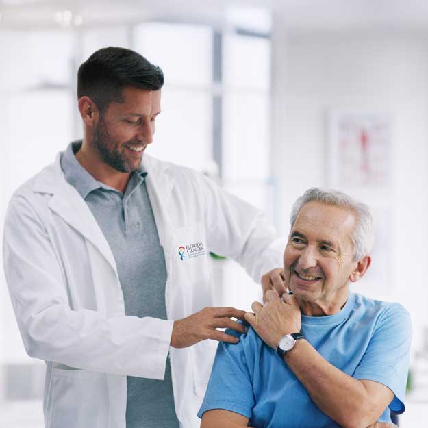 Male Doctor with Senior Male Patient