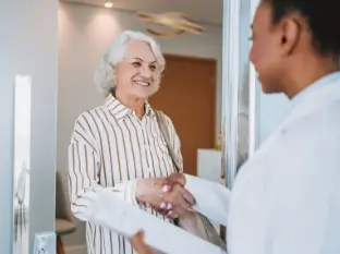 FCS care team member communicating clearly with a cancer patient about their questions